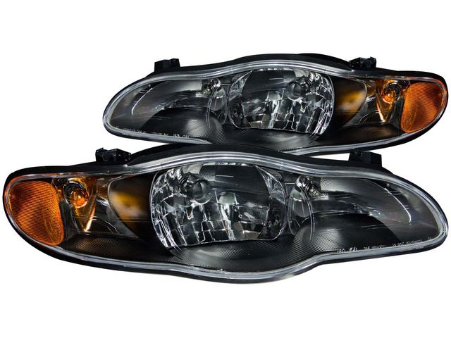 TRQ 2-Piece Headlight Assembly Set - Compatible With 2000-2005 Chevrolet Monte Carlo (Driver & Passenger Side)